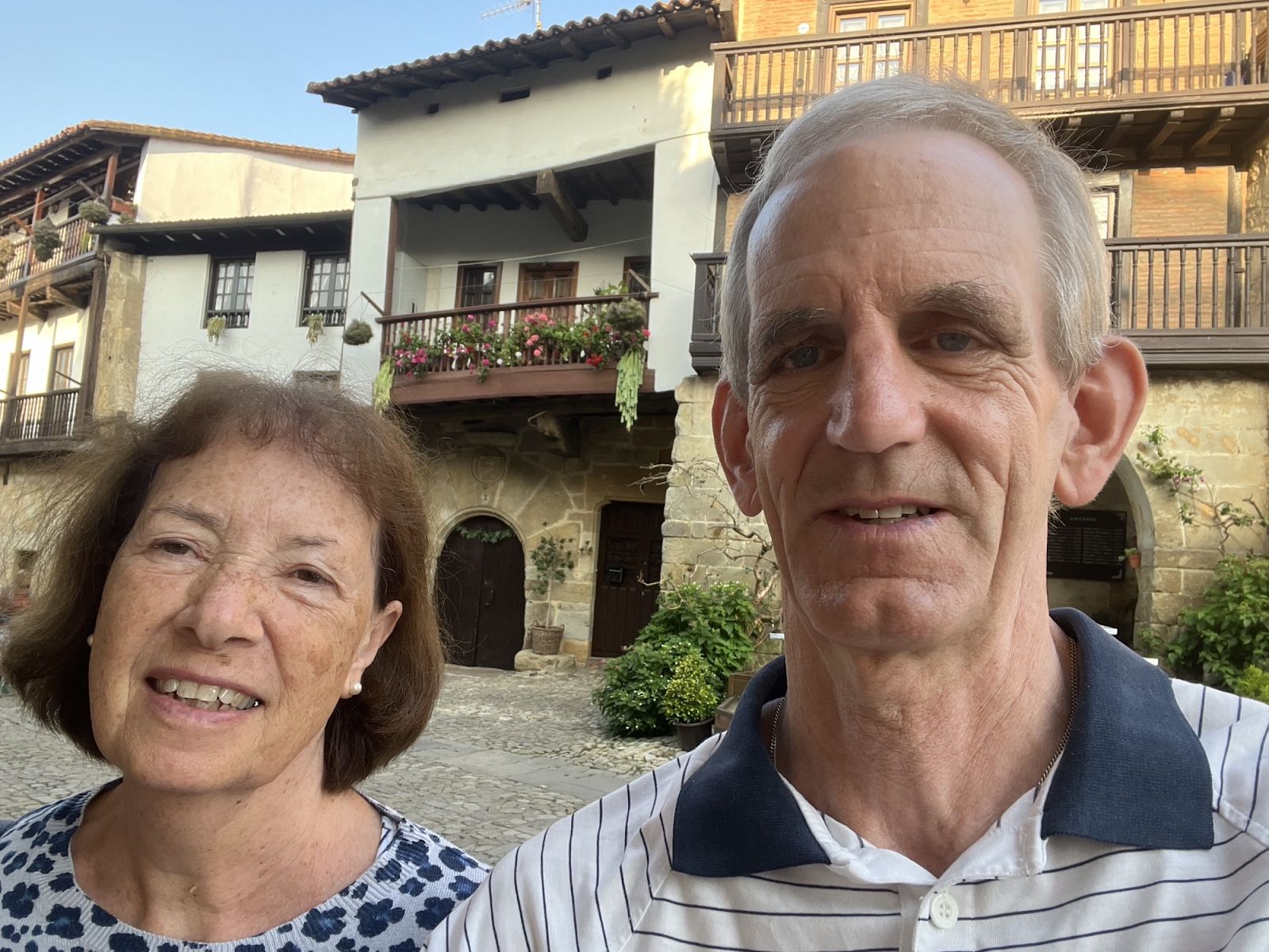 John and Linda smiling at the camera.