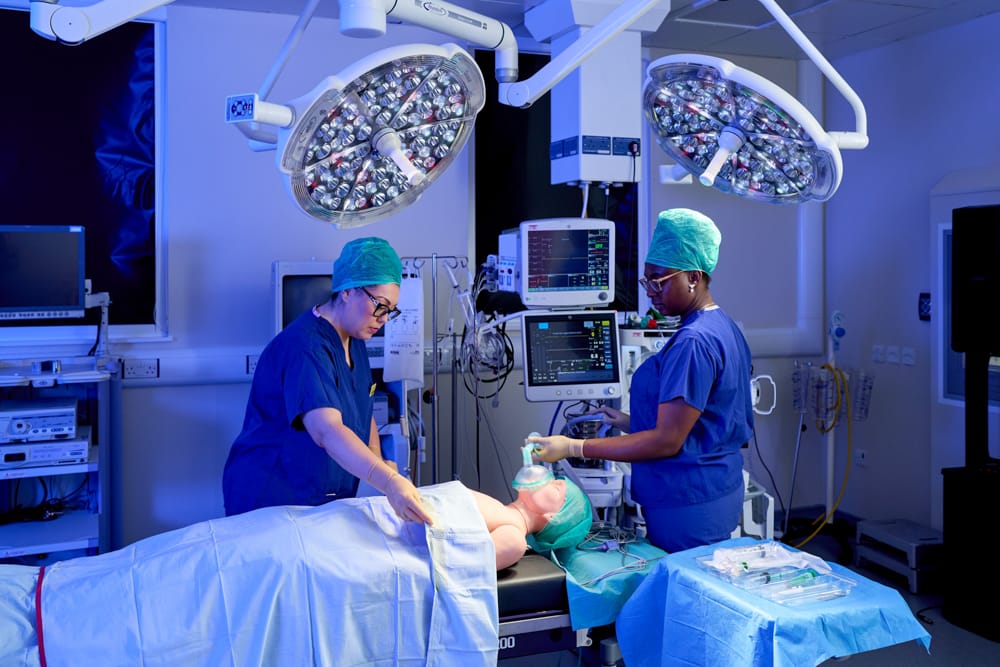 Surgeons in theatre with a patient